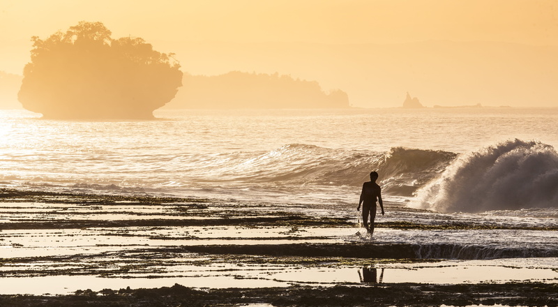 beauty in nature, outdoors, fishermen, leisure activity, standing, water, sky, walking, sour golden coast, indonesia, one person, man, land, nature, beach