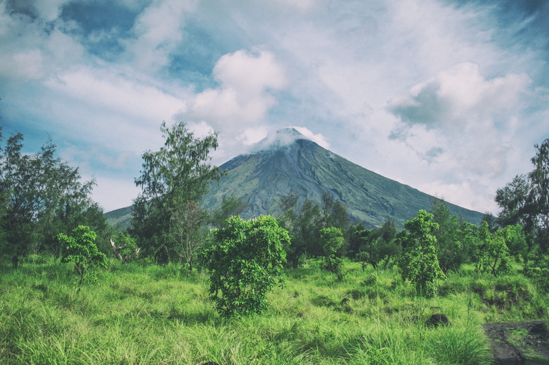 Mayon Volcano, landscape, daylight, scenics - nature, tranquility, cloud - sky, nature, clouds, plant, tree, grass, environment, volcanic crater, smoke - physical structure