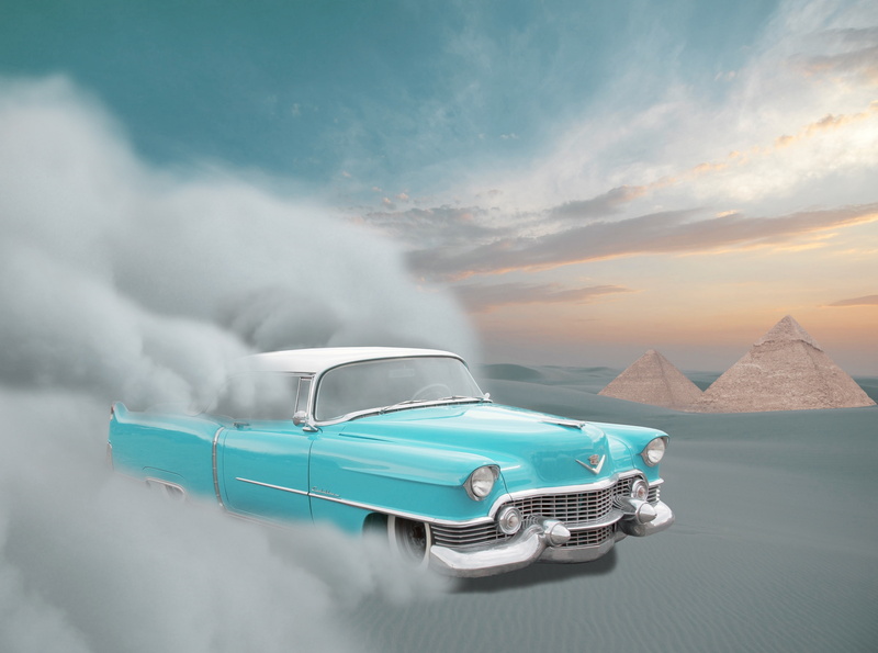 land vehicle, built structure, coupe, travel, day, sky, digital composite, Aero, desert, no people, cadillac, transportation, motion, sandstorm, beauty in nature