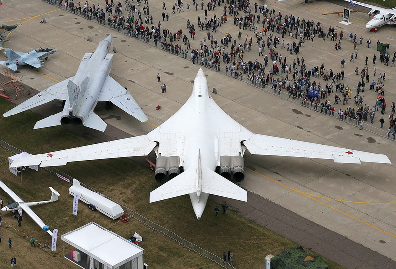airplane, high angle view, Yakovlev Yak-130, Bomber, travel, aircraft wing, outdoors, strategic bomber, incidental people, transportation, Tupolev Tu-160