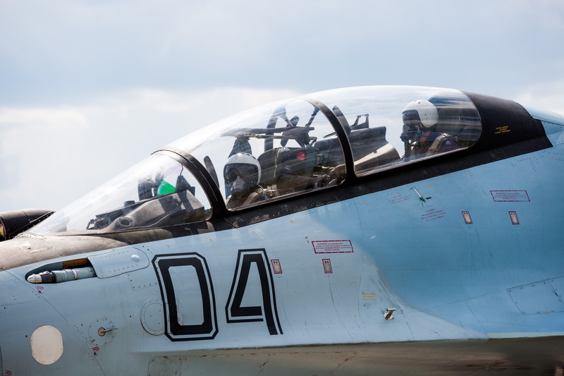 military airplane, travel, outdoors, army, government, sukhoi Su-30, glass - material, transportation, airplane, fighter plane, nature, pilot, airport