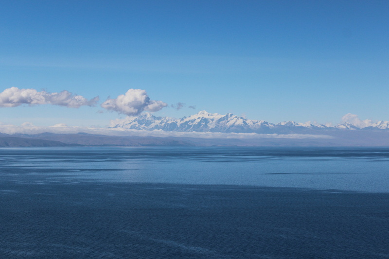waterfront, beauty in nature, water, cloud - sky, no people, non-urban scene, Titicaca, scenics - nature, tranquil scene, clear sky, 4K, copy space, sea