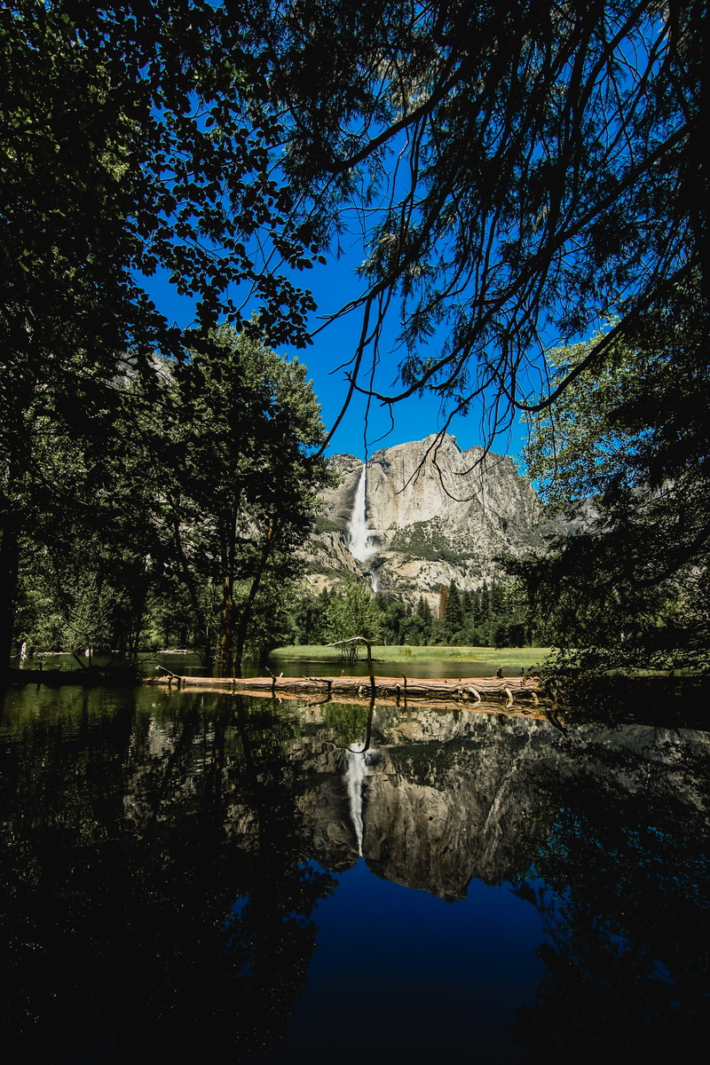 architecture, blue sky, united states, scenics - nature, landscape, built structure, sky, space, yosemite, symmetry, outer space, reflection, tree, water
