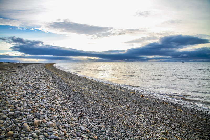 tranquility, stone - object, beauty in nature, scenics - nature, rocky coast, day, stone, sea, land, pebble, solid, blue sky, north, longyearbyen, cloud