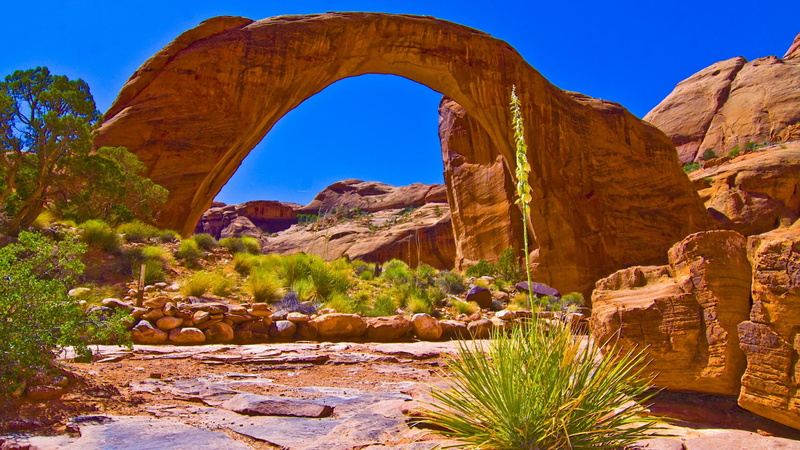 sacred, sky, no people, outdoors, navajo, sandstone, rock formation, travel, rainbow bridge, natural arch, desert, rock, united states, landscape, physical geography
