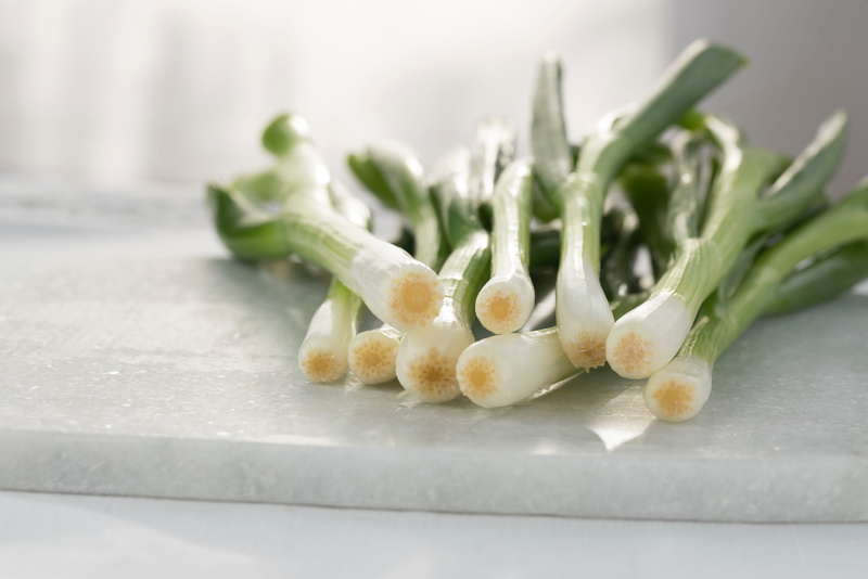 vegetables, green color, group of objects, spring, onion, cutting board, still life, green, chinese food, focus on foreground, vegetable, ingredient, food