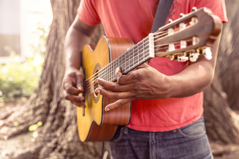 playing, wearing, day, guitar, midsection, man, musical equipment, song, rock, swirl, instrument, note, musical instrument, business, t, outline, red, pick