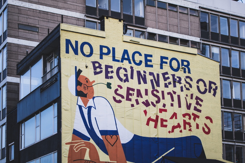 building exterior, city, mural, outdoors, built structure, no people, 5K, communication, sensitive, human representation, place, building, information