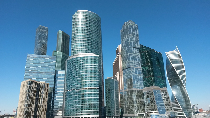 sky, building exterior, glass, structure, office center, clear sky, built structure, office building exterior, city, megalopolis, office, skyscrapers, moscow city
