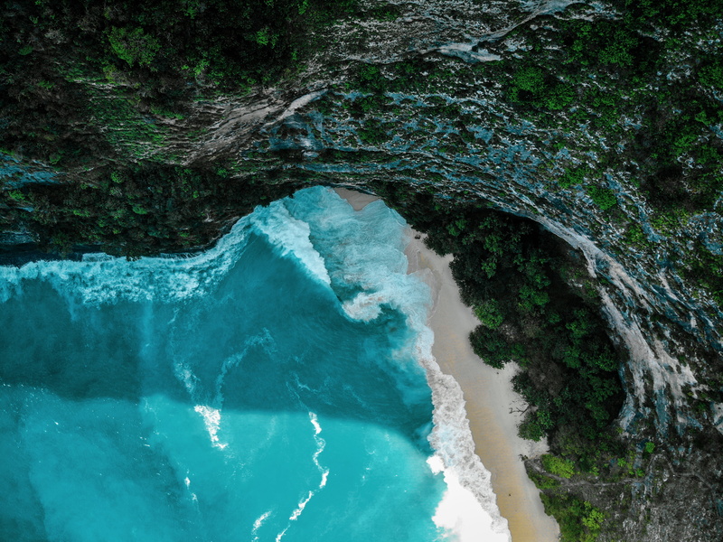beach, land, seaworld, tranquil scene, surf, flowing, dronephotography, day, scenics - nature, rock - object, daytime, motion, travel, outdoors, ocean