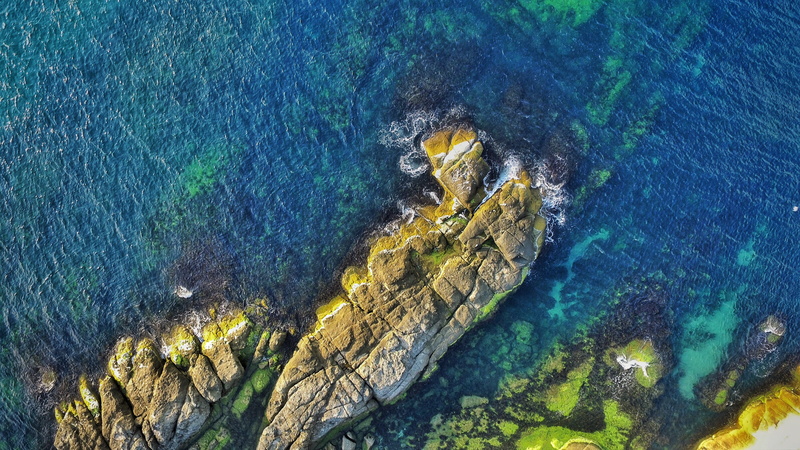 nature, turquoise colored, solid, shoreline, tranquility, sun, rock, land, drone view, view, aerial, stone, cape, daytime, sea, body, no people, blue, rock - object