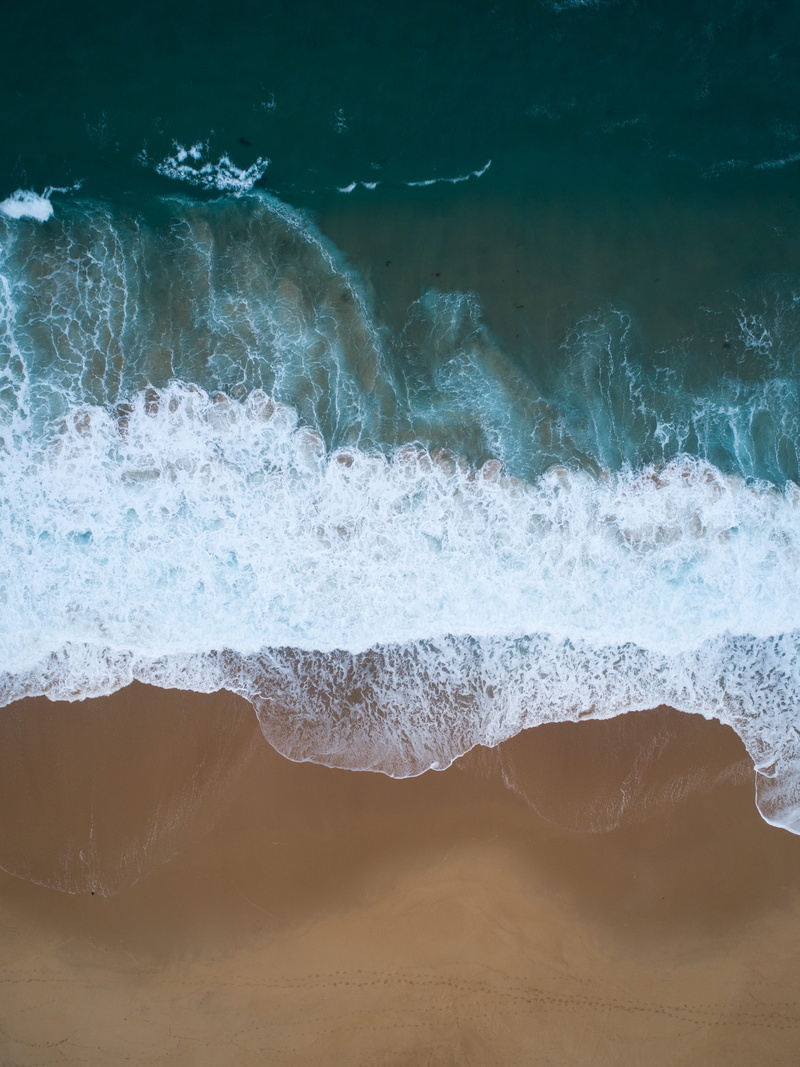 beauty in nature, power in nature, sand, aquatic sport, ocean, drone, surf, aerial, day, nature, power, wave, sport, seawaves, blue, outdoors, water, coastline