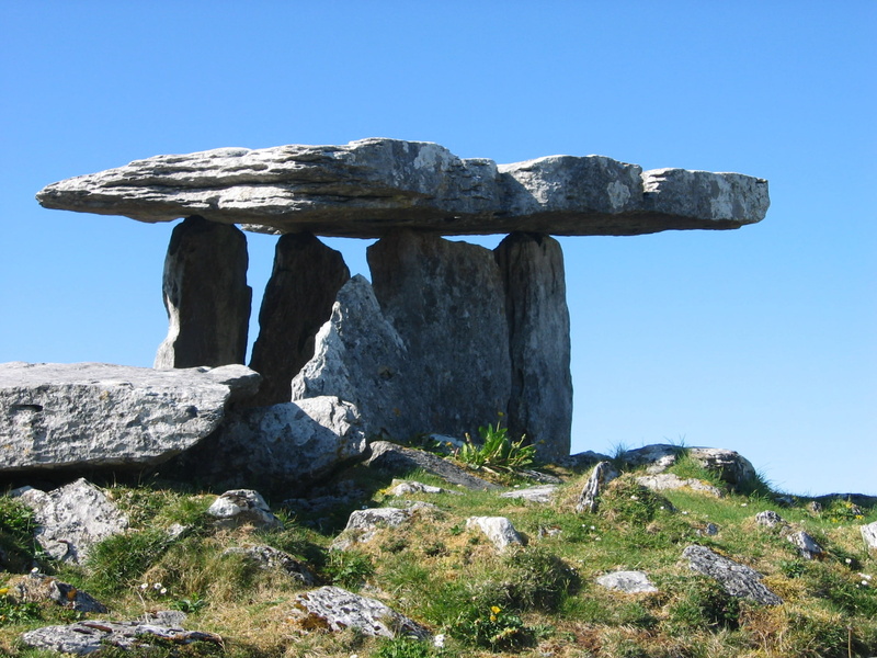 clear sky, tranquil scene, rock - object, archaeology, day, travel destinations, non-urban scene, sky, nature, plant, dolmen, blue, mountain, beauty in nature
