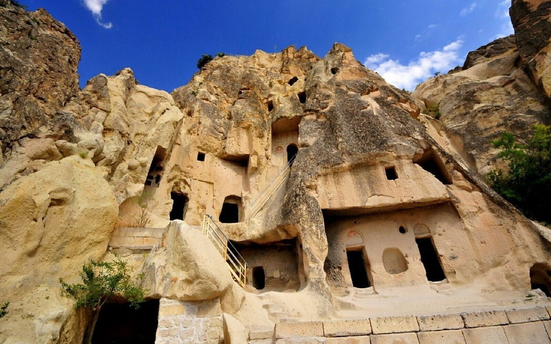 sky, ancient civilization, low angle view, no people, sunlight, rock formation, mountain, the past, old ruin, rock, outdoors, 720P, solid, Cappadocia
