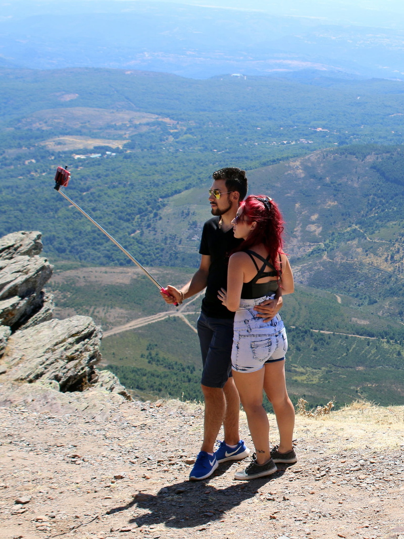 positive emotion, smiling, photographer, real people, the groom, young woman, photography, scenics - nature, leisure activity, women, mountain, hiking
