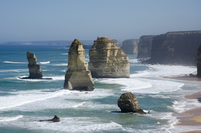 sea waves, water, promontory, scenics - nature, sky, grey, island, land, nature, tranquil scene, rock formation, twelve apostles, sand, motion, cliff, beauty in nature