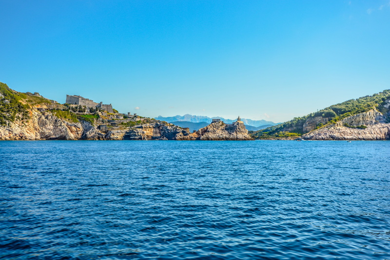 sea, outdoors, rock, beauty in nature, holiday, land, coast, portovenere, island, summer, gulf of poets, day, view, clear sky, italian, church, castle
