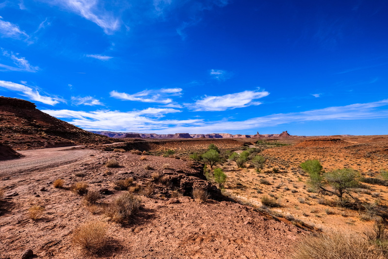 tranquility, tranquil scene, cloud - sky, landscape, sand, sky, solid, soil, rock, arid climate, road, mesa, savanna, environment, rock - object, scenery