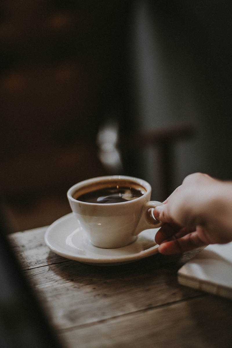 holding, hot drink, mug, saucer, breakfast, liquid, white, caffeine, focus, tea cup, cappuccino, brown, espresso, cafe, coffee, ceramic, real people, human body part