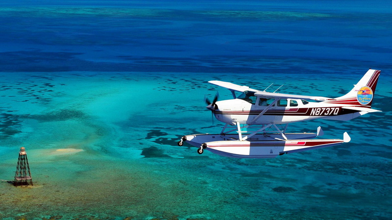 sport, vehicle, water, aerial view, mode of transportation, day, land, undersea, underwater, scuba diving, travel, air vehicle, airplane, outdoors, blue