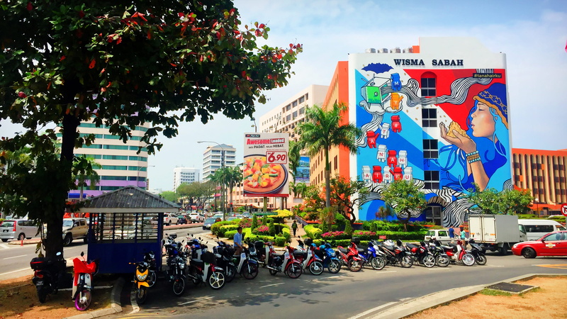 2K, day, kota kinabalu, building exterior, car, built structure, tree, city street, road, real people, plant, outdoors, city, suria sabah shopping mall