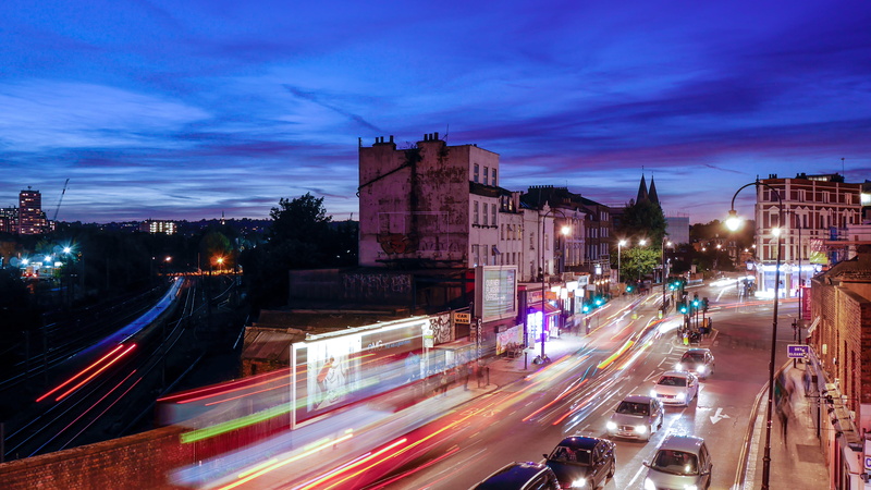 city, built structure, city street, city life, blurred motion, vehicle light, long exposure, traffic, lights, road, mode of transportation, dusk, transportation
