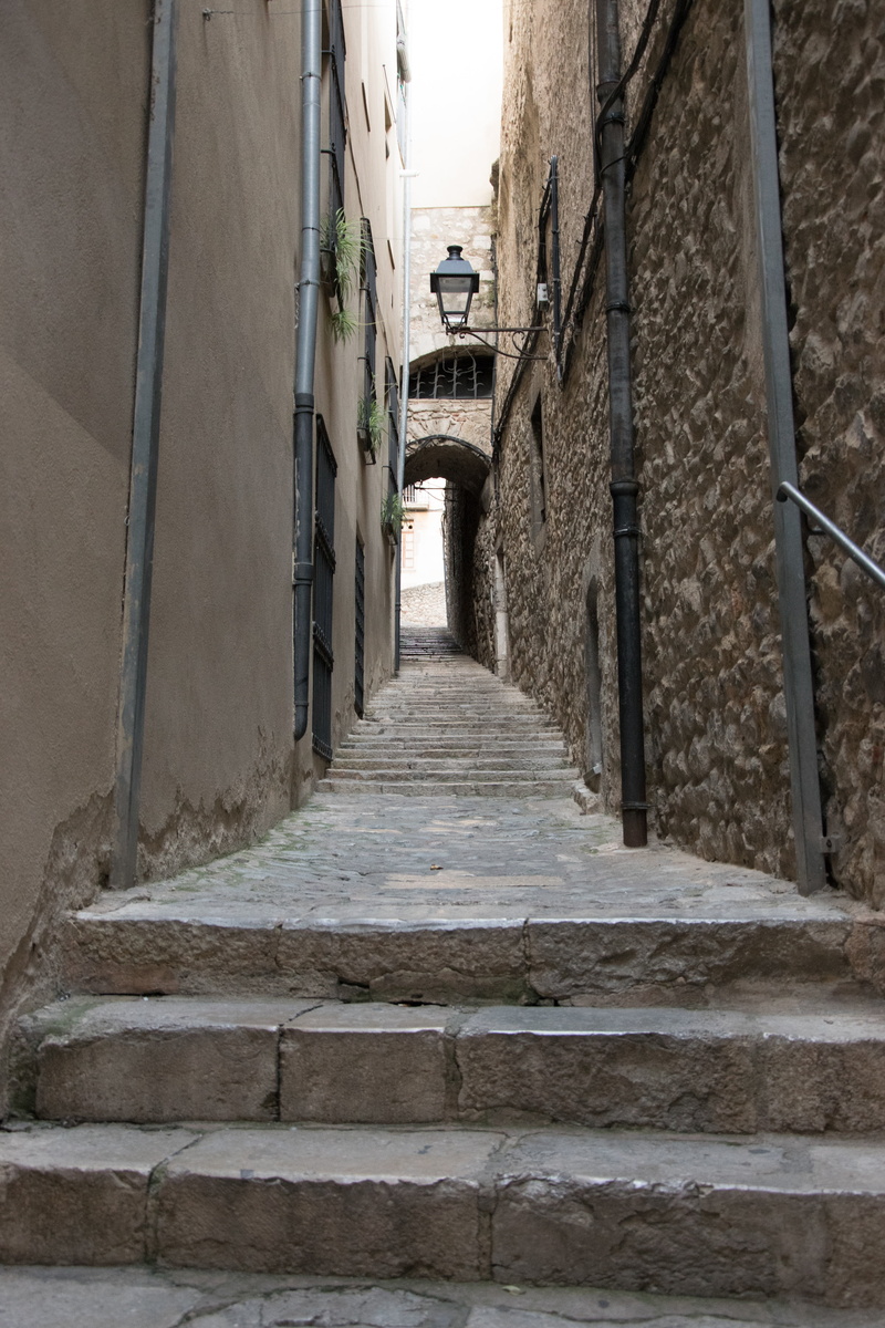 gerona, building exterior, architecture, low angle view, built structure, empty, narrow, staircase, outdoors, railing, residential district, building, alley