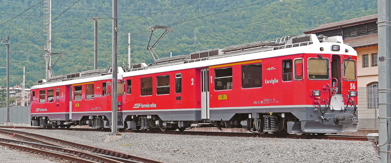 rail transportation, land vehicle, built structure, day, wait track, mode of transportation, bernina railway, mountain, tirano, cable, bernina, station