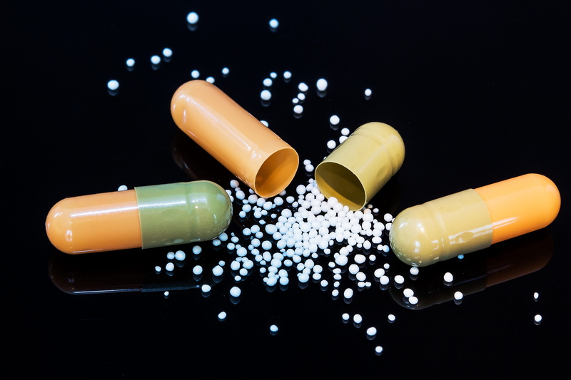 black background, group of objects, nutritional supplement, capsule shell, gelatin, choice, tablets, bless you, science, medicines, contents of capsule