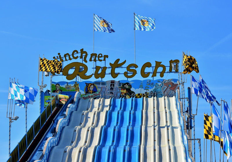 fun, flag, oktoberfest, nature, sign, communication, float, munich, carnies, multi colored, building, entertainment, festival site, wind, pleasure, clear sky