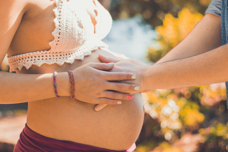 daytime, baby, sunlight, positive emotion, young adult, pregnat, couple - relationship, midsection, females, human hand, woman, outdoors, focus on foreground