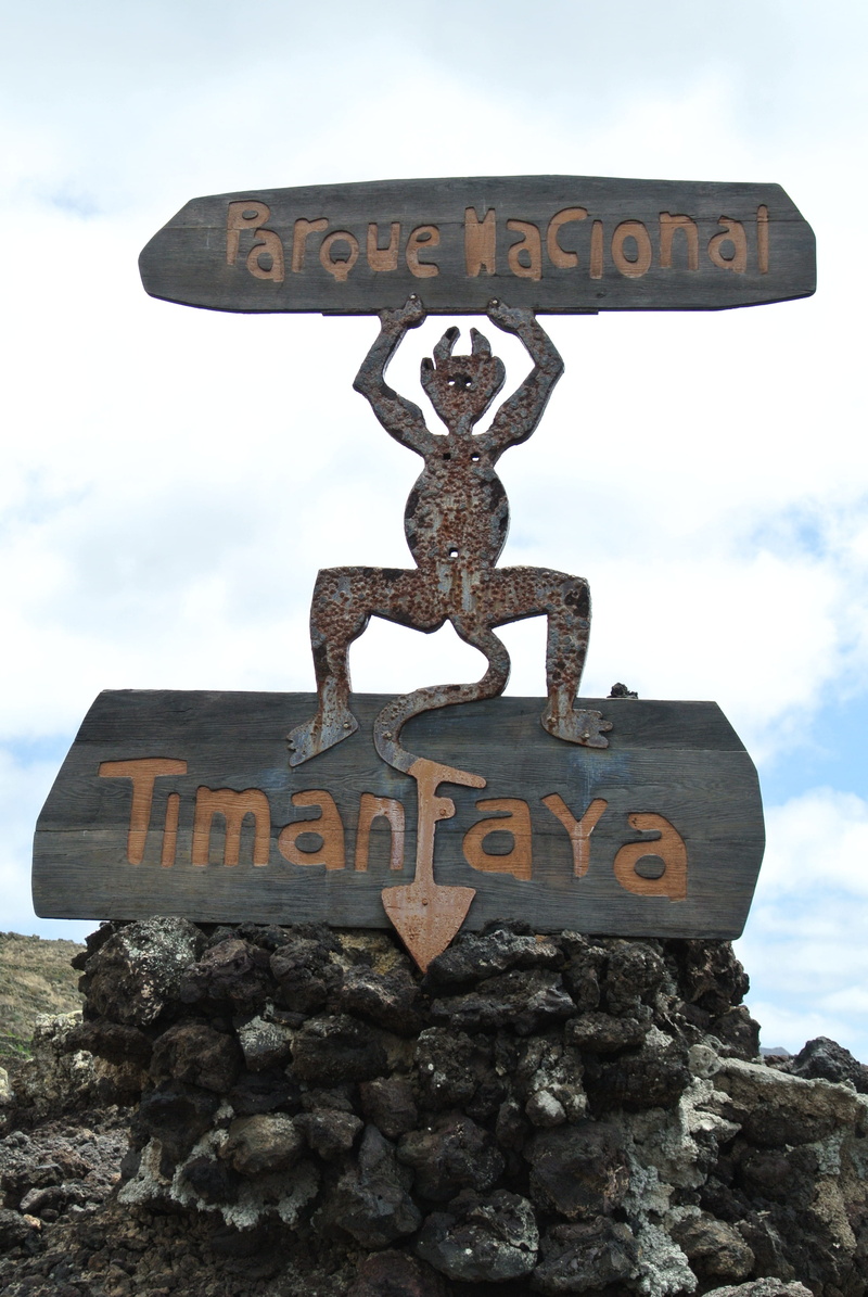 text, sign, devil, outdoors, 4K, non-western script, cloud - sky, western script, information, volcanic stones, rock - object, no people, rock, capital letter