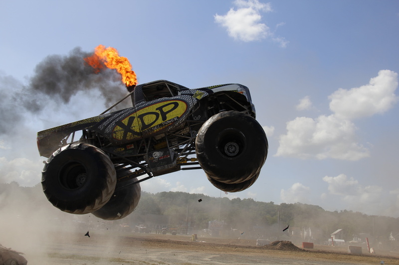 smoke - physical structure, nature, cloud - sky, mid-air, land, black, jump, day, extreme sports, motion, diesel, land vehicle, outdoors, sky, no people