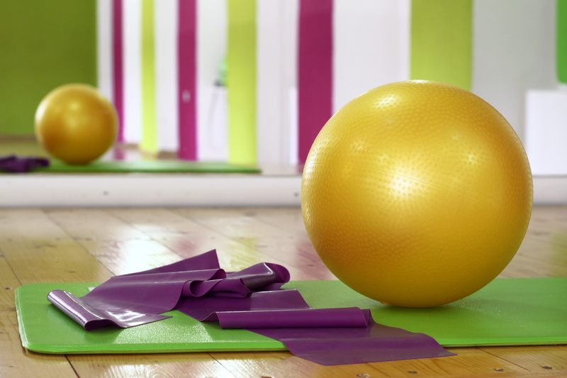 athletic, active, indoors, fit, lifestyle, young, woman, healthy, healthy eating, yellow, apple - fruit, focus on foreground, weight, pilates, wellbeing