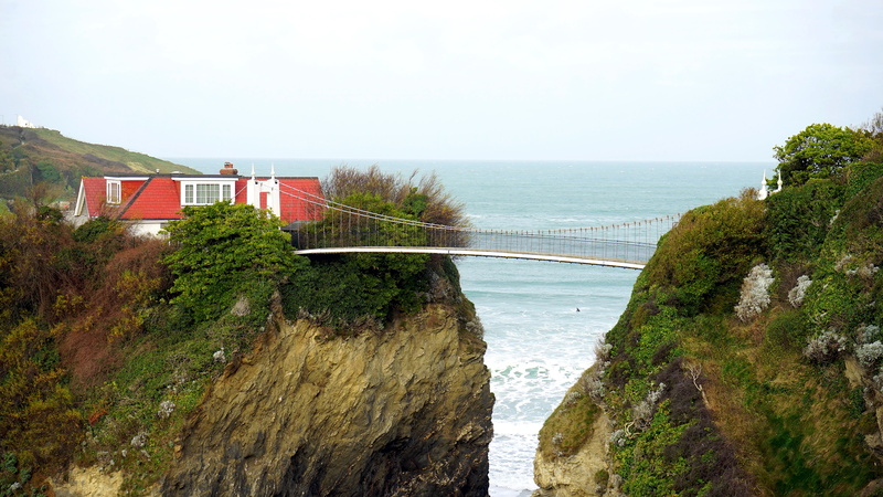 rock, style, residential, residence, grass, bridge, landmark, built structure, red, beach, building, house, cliffs, sky, private, tree, landscape, dwelling