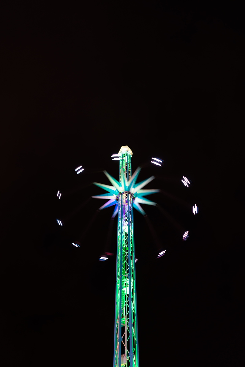 ferris wheel, outdoors, black background, multi colored, night photography, royal parks, amusement park ride, winter wonderland, enjoyment, no people, friend