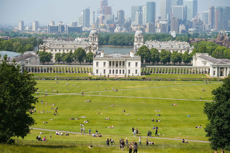 queens palace, built structure, high angle view, park, palace, travel destinations, crowd, summertime, building exterior, nature, outdoors, field