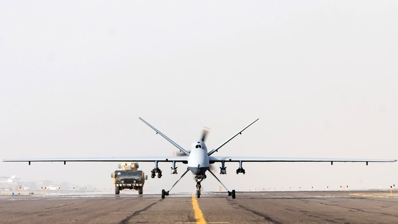 copy space, drone, military aircraft, airport runway, military, day, aerospace industry, outdoors, MQ-9 Reaper, air vehicle, travel, sky, mode of transportation