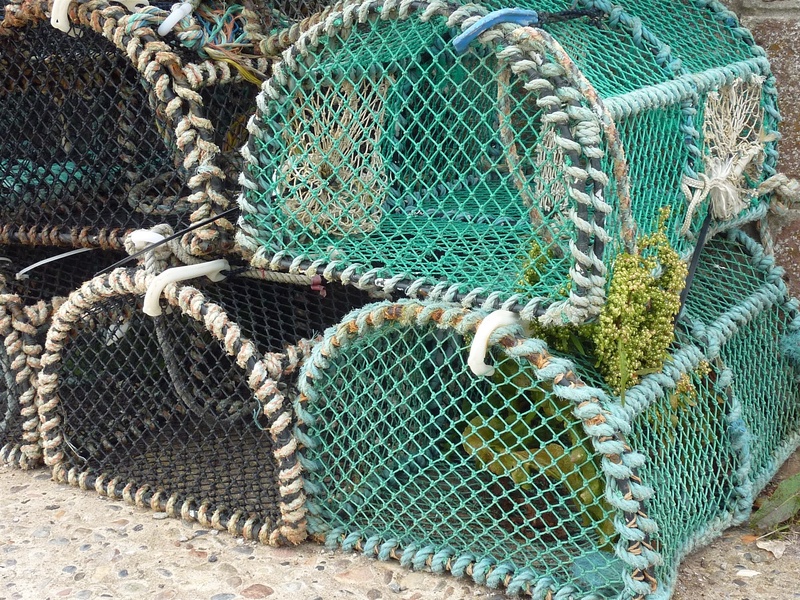 stack, green color, fischer, nature, connection, outdoors, transportation, high angle view, lobster baskets, fishing, no people, rod, rope, complexity