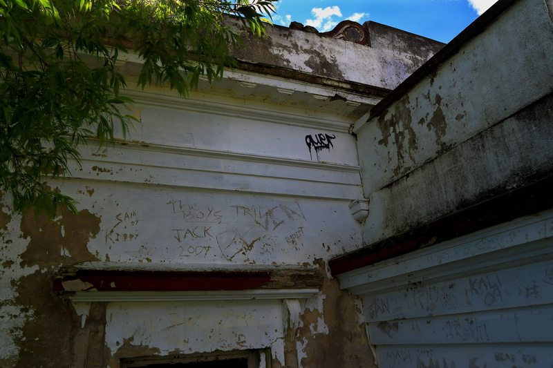 weathered, text, new zealand, architecture, cromwell, door, no people, wall - building feature, outdoors, plant, ruin, low angle view, communication, building exterior