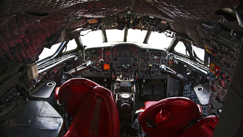 indoors, vehicle interior, control panel, vehicle, close-up, day, no people, air vehicle, window, airplane, control, metal, red, travel, aerospace industry