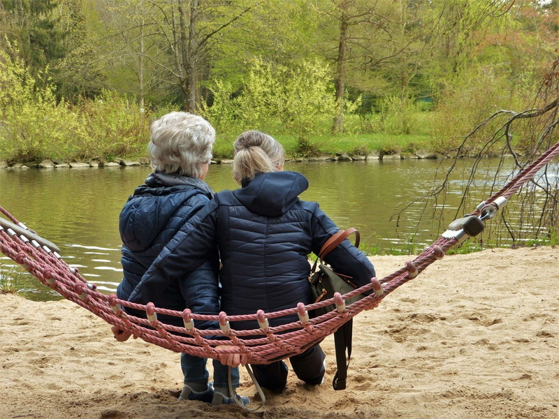 real people, enjoy, males, togetherness, grandmother, water, plant, people, day, friendship, girlfriends, age, rear view, affection, depression, warm clothing