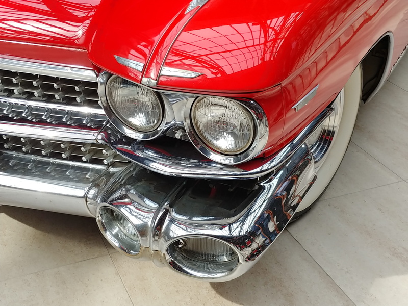 car, high angle view, black color, shiny, old-fashioned, retro styled, chrome, motor vehicle, red, close-up, silver colored, mode of transportation, collectors car