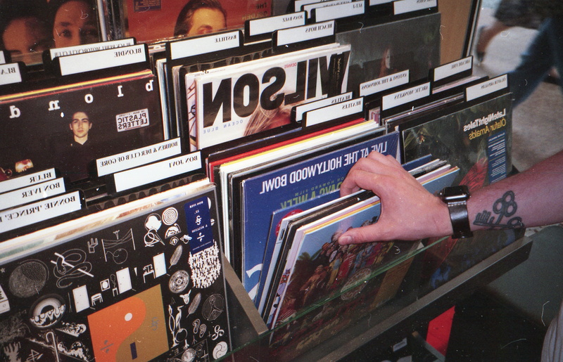 record shop, human, audio, people, gambling, interior, vinyl shop, leisure activity, music, vinyl, luck, finance, finger, arts culture and entertainment
