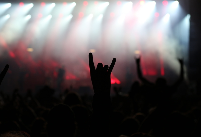 music, human arm, body part, metal, crowd, rock, concert, silhouette, music festival, audience, human body part, arts culture and entertainment, human hand