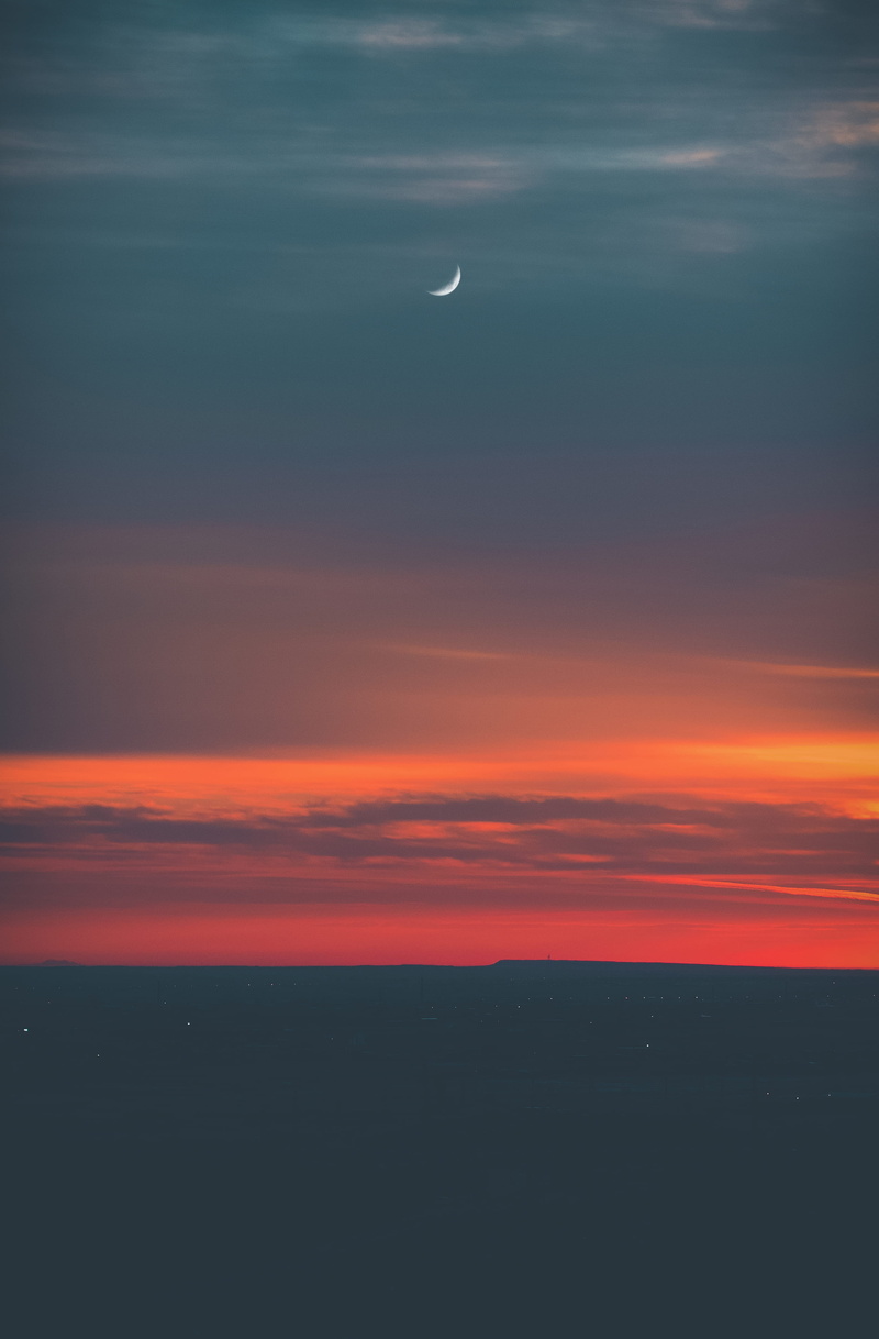 tranquility, cloud - sky, half, outdoors, orange, horizon over water, sky, beauty in nature, idyllic, no people, horizon, orange color, silhouette, nature