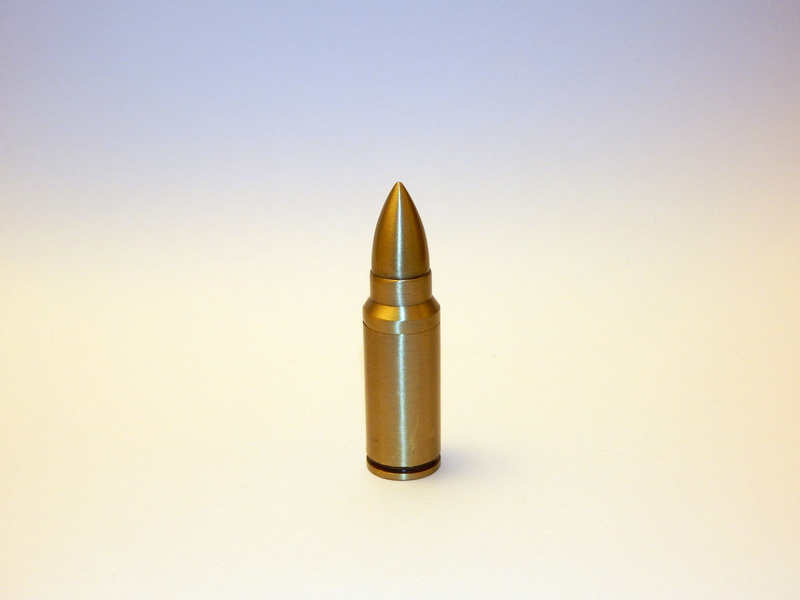 metal, silver colored, army, bronze, studio shot, ammunition, gun, indoors, aggression, bullet, sharp, two objects, close-up, colored background, projectile