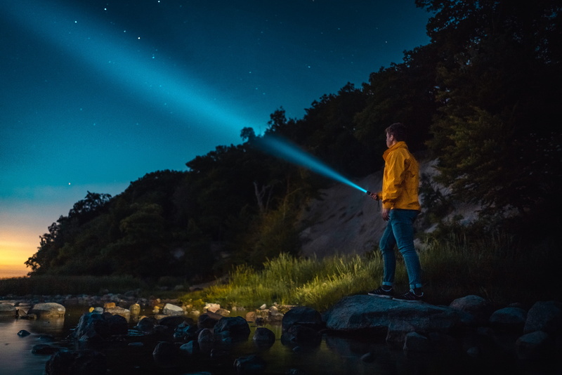 star, real people, 4K, space, rock, men, nighttime, yellow, light beam, body, star - space, beauty in nature, water, landscape, adventure, solid, front