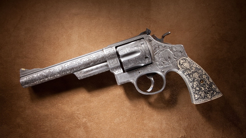 metal, silver colored, no people, studio shot, knife - weapon, indoors, communication, close-up, revolvers, still life, single object, security, table
