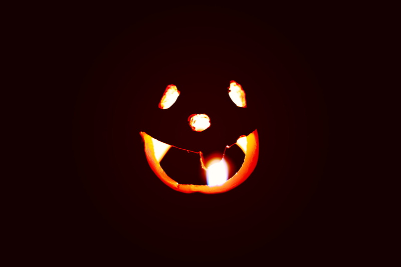 jack O Lantern, indoors, food, black Color, heat - temperature, smiling, dark, studio shot, lantern, illuminated, fun, candle, copy space, horror, anthropomorphic face